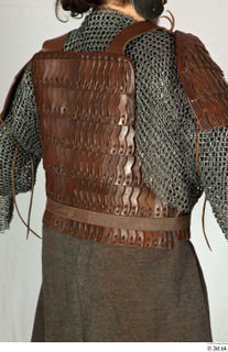  Photos Medieval Soldier in leather armor 5 Medieval clothing Medieval soldier brown gambeson chest armor leather armor 0007.jpg